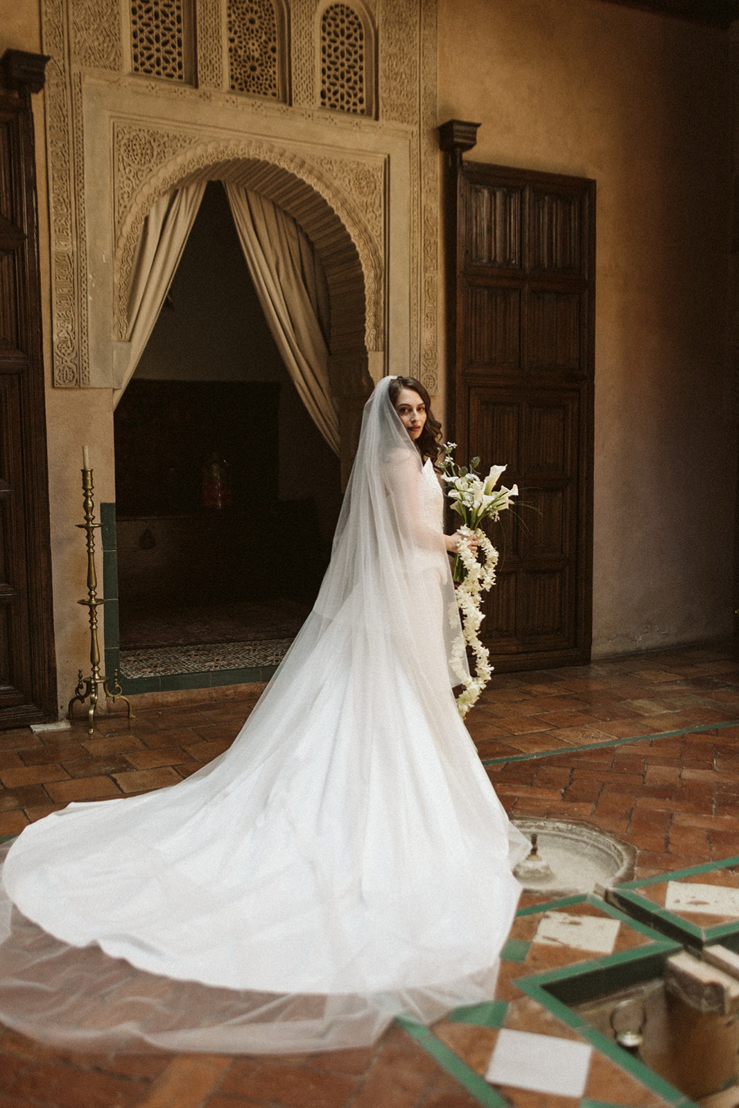 The ceremony gown in a courtyard in Granada